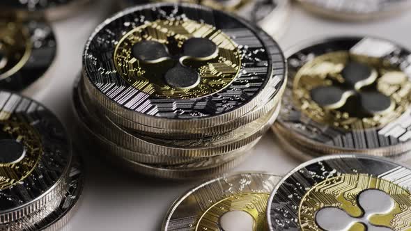 Rotating shot of Bitcoins (digital cryptocurrency) - BITCOIN RIPPLE