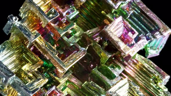 Macro of the Stone Bismuth Mineral on a Black Background Close Up