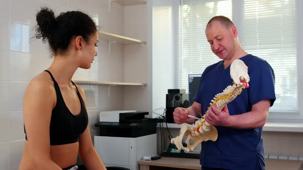 Doctor Inspecting the Young Woman Before the Session