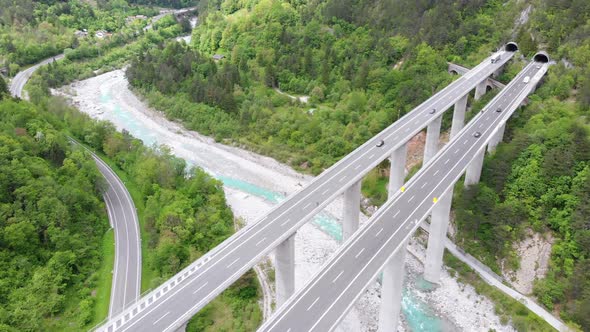 Aerial View of the Concrete Highway Viaduct on Concrete Pillars in the Mountains