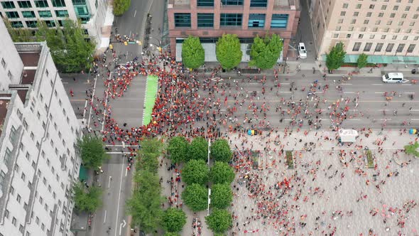 Indigenous Protesters in Downtown Vancouver Gather to Cancel Canada Day, Drone Shot Moving Forward i