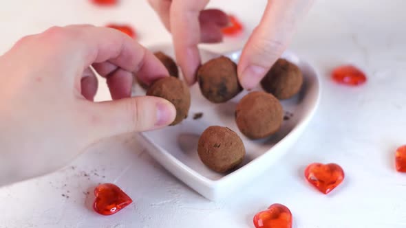 Chocolate truffles covered in cocoa powder. Dessert for Valentines Day