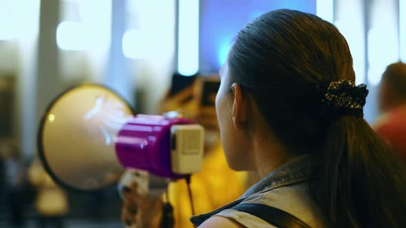 Civil Rights Feminist Activist Speaker with Bullhorn on Picket Strike Protest