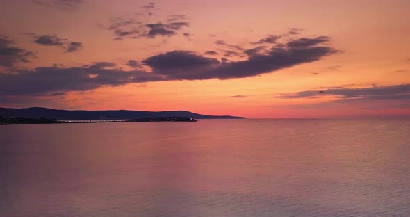 sunset morning ocean dark beach view clouds golden hour