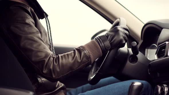 Man Driving Auto.Hand On Car Steering Wheels.Male Driver Turning Steering Wheel In Car.Car Travel