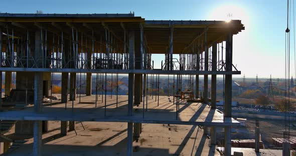 Aerial View High Rise Building Under Construction in Assembling the Frame From Building Materials