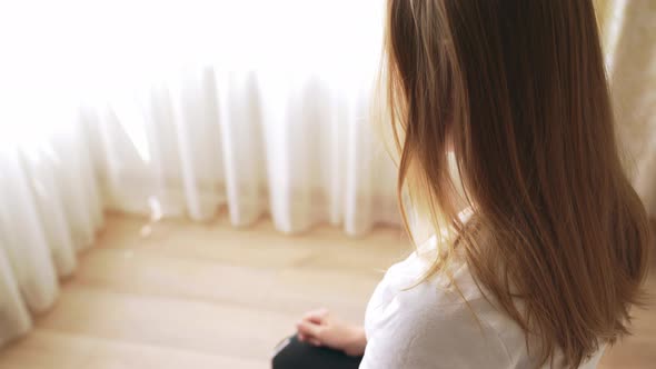 Young Woman Holding Pregnancy Test.