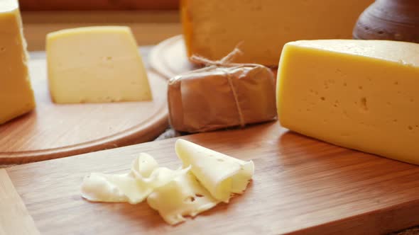 Beautiful Background Footage Screensaver Cheese on Wooden Board Home Production Eco Products Indoor