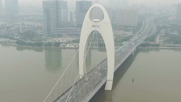 Liede Bridge on Pearl River. Guangzhou City in Smog, China. Aerial View
