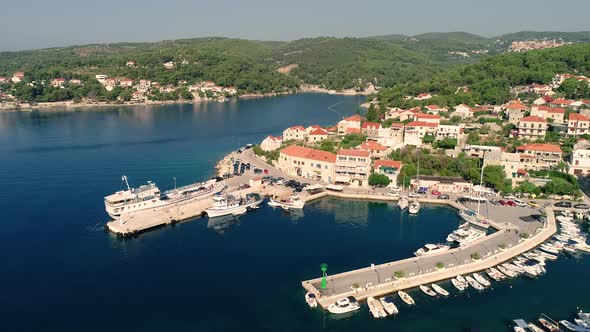 Aerial view of Sumartin port with a ferry transport, Brac island, Croatia.