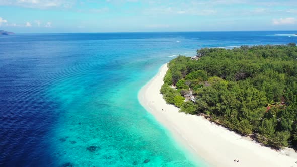 Aerial above texture of relaxing sea view beach vacation by shallow ocean with bright sandy backgrou