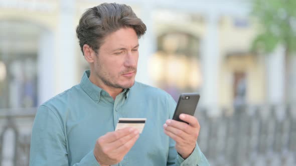Outdoor Man having Online Payment Failure on Smartphone