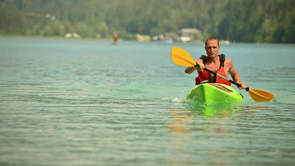 Kayaker in a Touring Kayak on the Scenic Lake