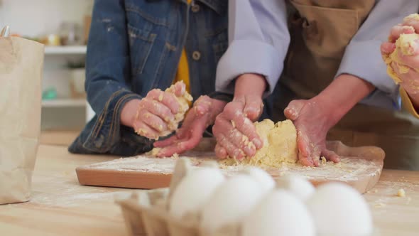 Family Cooking Dough Together