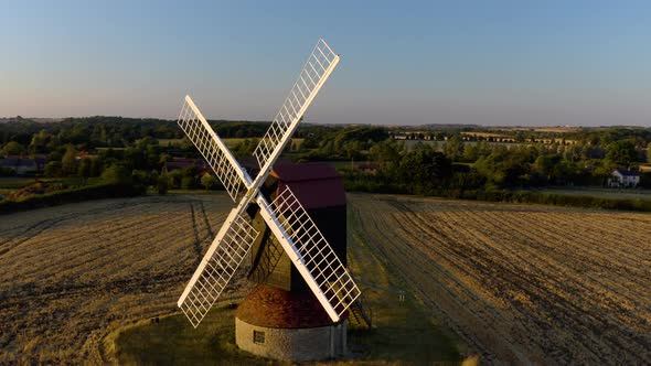 Old inactive wooden windmill. 