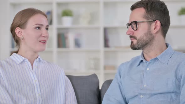 Portrait of Attractive Young Woman Talking to Her Partner