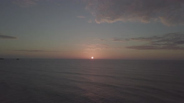 Sunset above water aerial