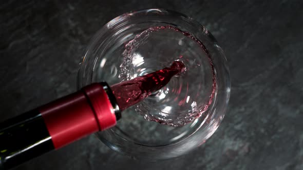 Super Slow Motion Shot of Pouring Red Wine Into Glass at 1000Fps