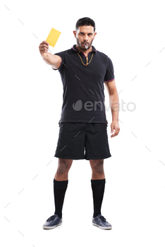r referee showing yellow card and blowing whistle while standing against white background