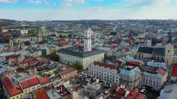 Aerial Drone Video of Lviv Old City Center - Roofs and Streets, City Hall Ratusha