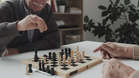 Senior Men Playing Chess at Nursing Home