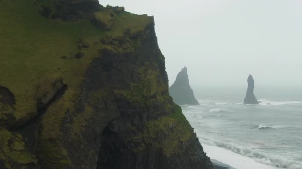 Reynisdrangar Rocks and Reynisfjall Mountain. Reynisfjara. Iceland. Aerial View