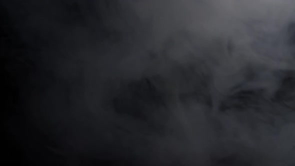 Soft Fog In Slow Motion On Dark Backdrop