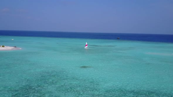 Aerial drone scenery of island beach by blue sea with sand background