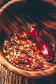 Ground red chili pepper in wooden bowl - PhotoDune Item for Sale