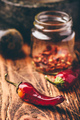 Dried red chili peppers on wooden surface - PhotoDune Item for Sale