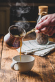 Pouring turkish coffee into white cup - PhotoDune Item for Sale