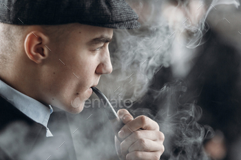 sherlock holmes look cosplay.  england in 1920s theme. fashionable confident gangster. atmospheric moments