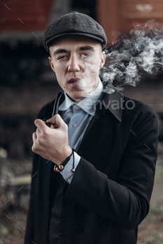  wooden pipe. england in 1920s theme. fashionable confident gangster. atmospheric moments. space for text