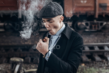 wooden pipe. england in 1920s theme. fashionable confident gangster. atmospheric moments. space for text