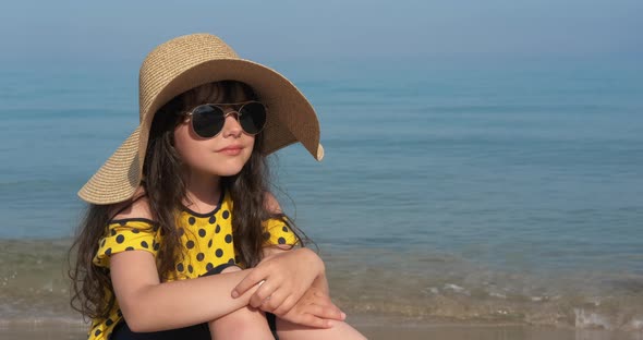 Little Girl on Sandy Beach