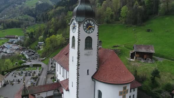 Aerial video of the Fluelen church in the Uri Canton of Switzerland