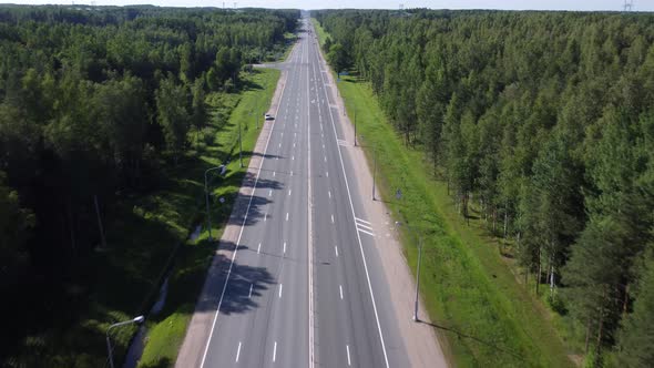 Flying on a Throne Over a Road in the Middle of the Forest