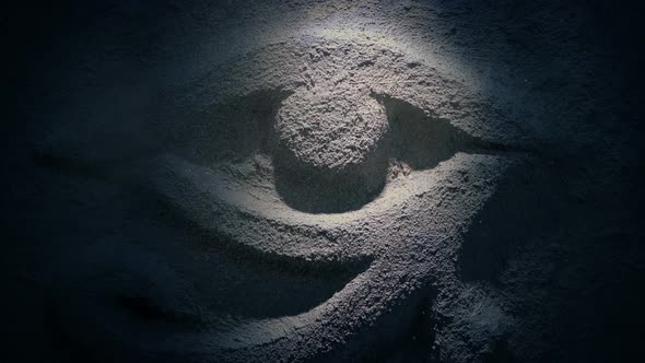 Light Shines On Ancient Stone Eye Carving