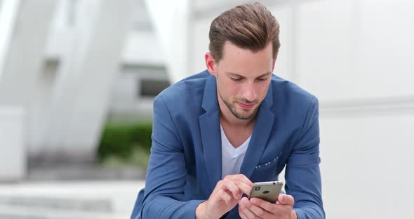 Caucasian Businessman use of mobile phone