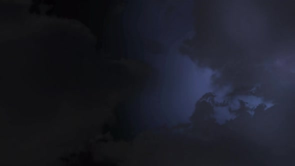 Sky with dark clouds and lightning alt