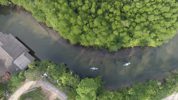 Over River with Two Kayaks