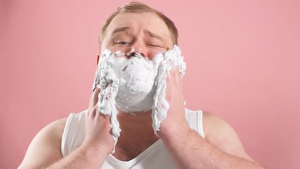 Astonished Man Has Shaving Foam on Face, Feeling Impressed By New Shaving Gel