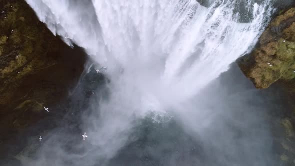 Aerial flight over Skogar waterfall, Iceland