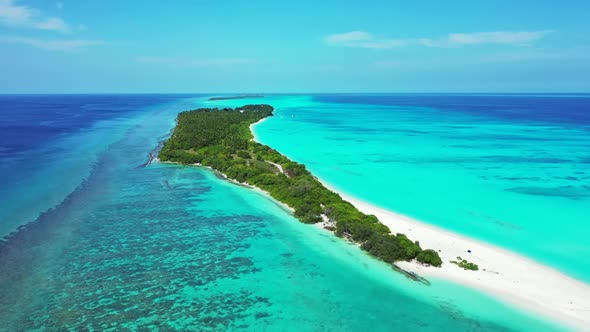 Aerial drone nature of tropical island beach journey by shallow ocean and white sandy background of 