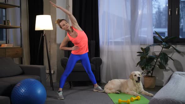 Sporty Fit Woman Exercising with Best Friend Dog