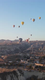 Vertical Video of Hot Air Balloons Flying in the Sky Over Cappadocia Turkey