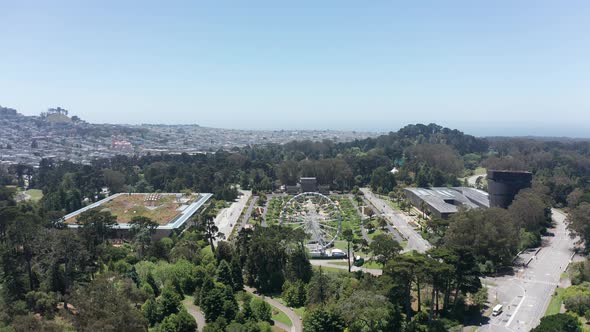 Aerial wide descending shot of the Music Concourse in Golden Gate Park, San Francisco. 4K