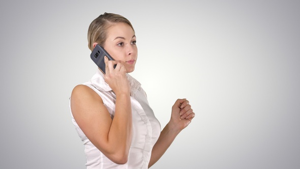 Charming business woman calling with cell telephone while