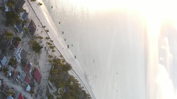 Vertical Video of the Ocean Near the Coast of Zanzibar Tanzania Aerial View