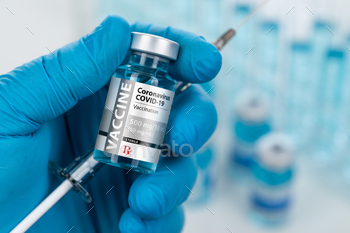onavirus COVID-19 Vaccine Vial and Syringe.